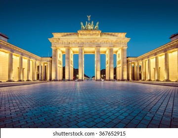 Classic view of famous Brandenburger Tor (Brandenburg Gate), one of the best-known landmarks and national symbols of Germany, in twilight during blue hour at dawn, Berlin, Germany - Shutterstock ID 367652915