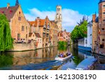 Classic view of the historic city center with canal in Brugge (Bruges), West Flanders province, Belgium. Cityscape of Bruges.