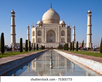 Classic view of Taj Mahal with reflections in a pond in Agra, India. - Shutterstock ID 75305773