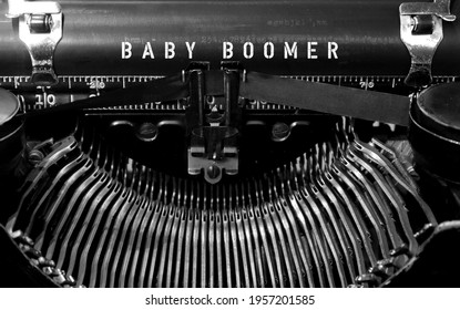 Classic vintage antique typewriter in black and white with typography BABY BOOMER, refers to those who born 1946-1964 raise in analog era, consumer of traditional media