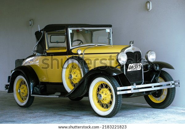 Classic vintage ford car\
in yellow. Art Deco Festival. February 2020, Napier, Hawke\'s Bay,\
New Zealand