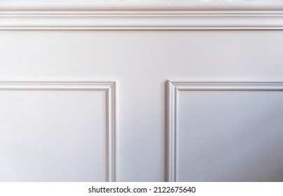 Classic Wainscot Wood Decoration Detail. Retro White Wooden Wall Panel Background, Closeup View. Interior Room Architecture Design