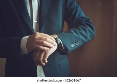 Classic watches in his hands