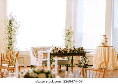 Classic Wedding Reception indoors with florals and tablescapes