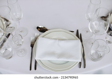 Classic White Decor Of A Festive Dinner Table In A Restaurant