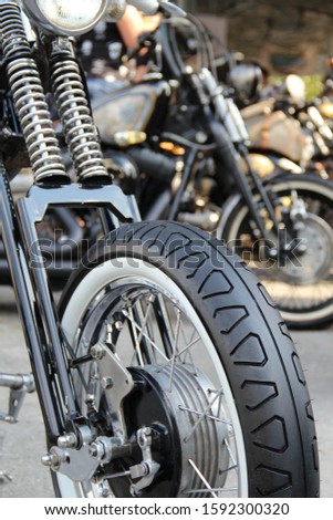 Classic White Wall Tire On The Front Wheel Of Custom Motorcycle
