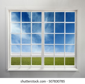 Classic White Window On A Brick Wall And The Garden View