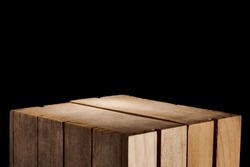 Classic Wooden Box On A Black Background As An Ideal Base For Displaying Cosmetic, Food And Other Products. Caja De Madera Clásica En Fondo Negro Como Base Ideal Para Exhibir Productos