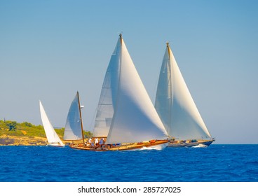 classic wooden sailing boats in a race, Spetses island in Greece - Powered by Shutterstock