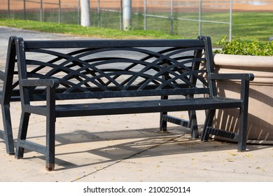 Classic Wrought Iron Bench In Park
