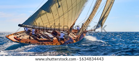 Classic yacht under full sail at the regatta. Sailing yacht race