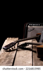 A Classical And An Acoustic Guitar, A Fedora On The Guitar. Guitar Amp In The Back. Stage Preparation.