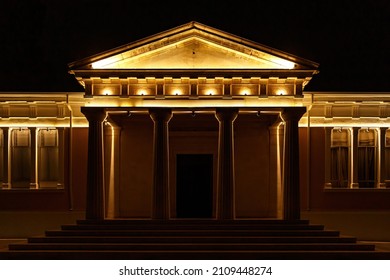 Classical Architecture Building With Columns Illuminated At Night