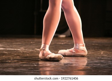 Classical ballet. Ballerina dancing. (step 5a position). Pas de bourrée. stage. Show. ballet shoes