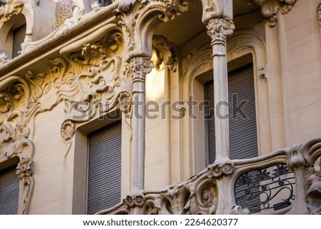 Classical baroque architectural building elements, stucco decor. Luxuriously decorated facade of an ancient balcony, windows, balcony, columns. Elements of architecture. Culture, historical heritage.