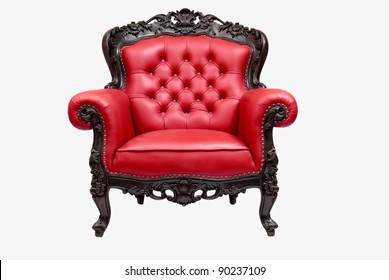 classical carved wooden chair upholstered in leather