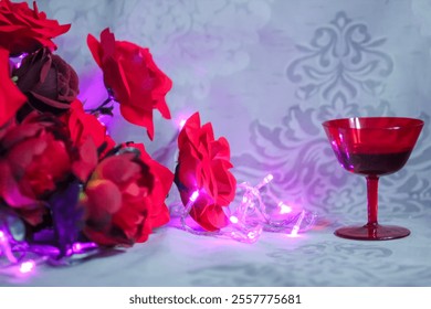 Classical concept of a bouquet of red artificial roses and peonies and a nice red glass with drink, still life, close up. festive,  valentines day, congratulation, abstract background, sstkBackgrounds - Powered by Shutterstock