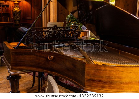 Classical Grand piano in a vintage room.