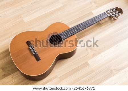 A classical guitar with six nylon strings