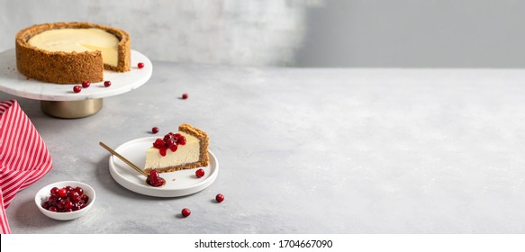 Classical New York Cheesecake On Gray Background. Bakery, Confectionery, Cafe Banner. Summer Dessert Recipe. Side View, Copy Space For Text