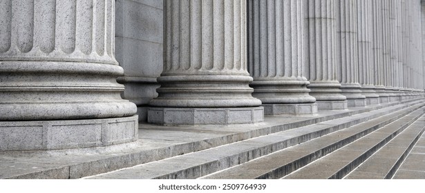 Classical pillars row in an office building facade. Stone colonnade and stairs detail.  - Powered by Shutterstock