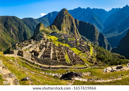 Classical view over Inca city of Machu Picchu, just after sunrise. Near Cusco, Peru. Unesco World Heritage site, one of the new wonders of the world. 