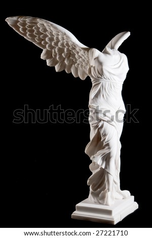 Classical white marble Nika statue isolated on black background