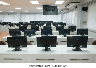 Classroom Computers. Empty No People With Many Monitor Computer On White Desk.