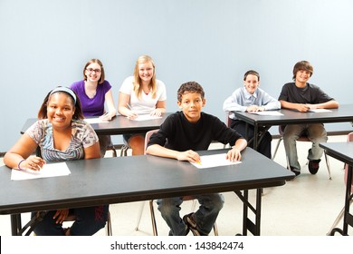 Classroom Of Diverse Students.  Wide Shot With Plenty Of Room For Text.