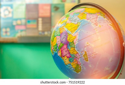 Classroom globes School Globes - model of Earth.Object of learning.Icon of orb.round solid figure map of continents and oceans. closeup