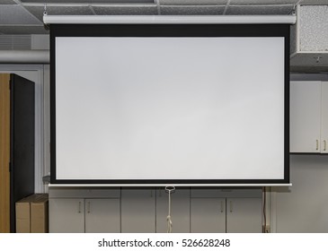 Classroom With An Old Fashioned Pull Down White Screen