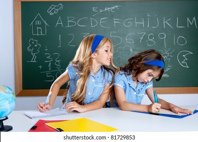 Classroom With Two Students Cheating On Test Exam At School