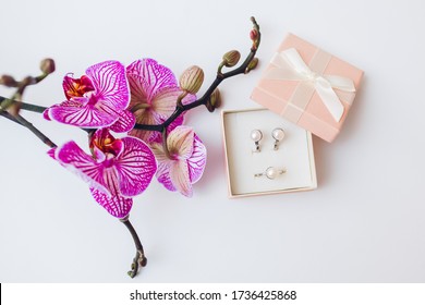 Classsic Jewellery. Silver Ring And Earrings With Pearls In Gift Box With Purple Orchid. Fashionable Accessories