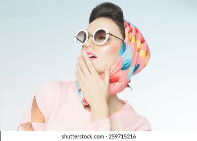 Classy Chic Sixties Style Fashion Retro Woman. Sunglasses And Silk Scarf.