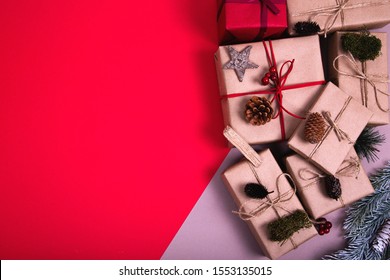 Classy Christmas Gifts Box Presents On Red And Grey Background. Flat Lat Winter Composition. Top View And Copy Space