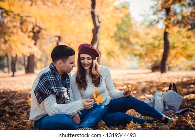 Classy Couple Is Spending The Day Outdoors In The Park, Enjoying The Day Together