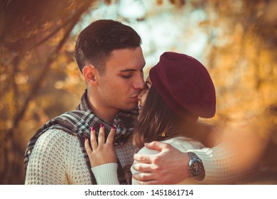 Classy Couple Is Spending The Day Outdoors In The Park, Enjoying The Day Together