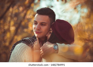 Classy Couple Is Spending The Day Outdoors In The Park, Enjoying The Day Together