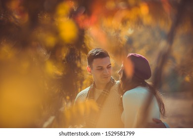 Classy Couple Is Spending The Day Outdoors In The Park, Enjoying The Day Together