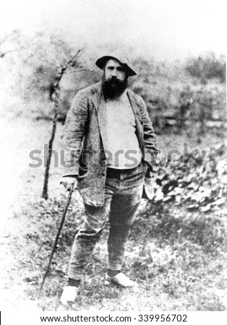 Claude Monet, at age 49, in his garden at Giverny, France 1890. Photo by Theodore Robinson.