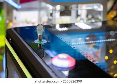 A claw machine controller and button. Claw Machines Toy Arcade game. doll picker.