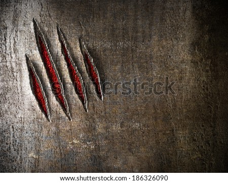 claw scratches on metal wall background