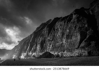 Clay cliffs tower over the pebble beach below on a cold Christmas Eve. - Powered by Shutterstock