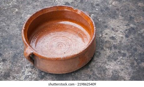 Clay Cooking Pot On Stone Surface