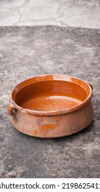 Clay Cooking Pot On Stone Surface