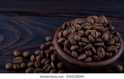 Clay cup full of roasted coffee beans and coffee beans scattered next to it on a wooden surface. - Powered by Shutterstock