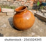 Clay Earthen Pot on Rustic Background with Natural Texture