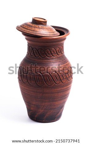 Clay jug with a lid on a white background.