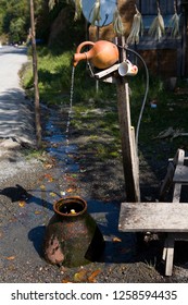 From A Clay Jug Water Flows. Georgia.