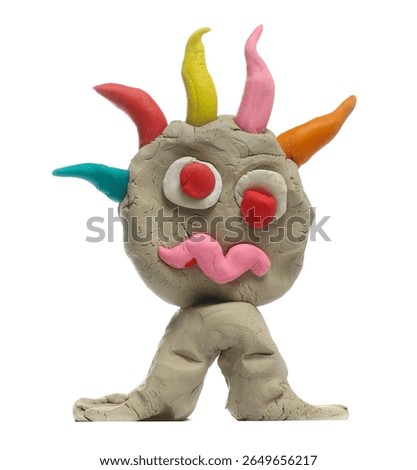 Clay modelling in shape clown, isolated on white